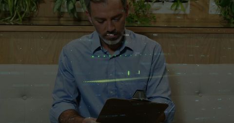 Caucasian Male Doctor Analyzing Financial Data Overlay