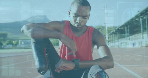 Adaptive Athlete Measuring Performance with Smartwatch on Track - Download Free Stock Images Pikwizard.com