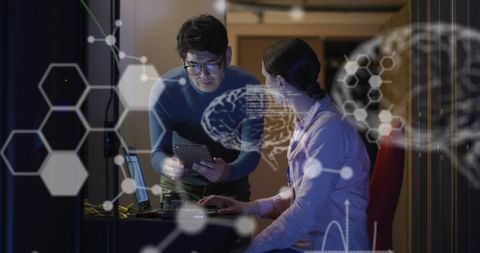 Technologists Analyzing Data with Futuristic Interface Overlays - Download Free Stock Images Pikwizard.com