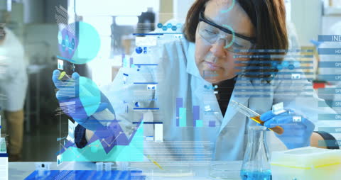 Female Scientist Analyzing Data in Laboratory Environment