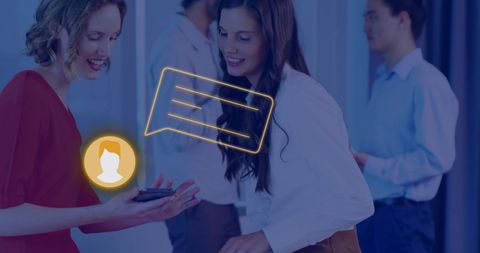Businesswomen discussing work with chat icon overlay