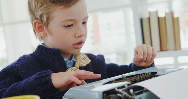 Curious Child Typing on Vintage Typewriter in Cozy Study Room - Download Free Stock Images Pikwizard.com