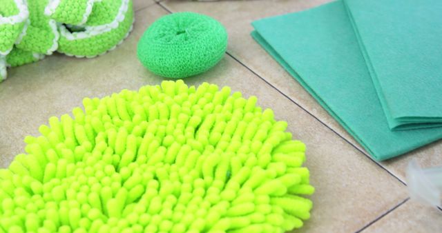 Bright Green Cleaning Supplies Including Scrubber and Microfiber Cloths - Download Free Stock Images Pikwizard.com