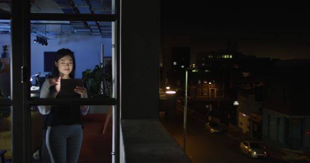 Woman Using Smartphone at Night by Window View - Download Free Stock Images Pikwizard.com