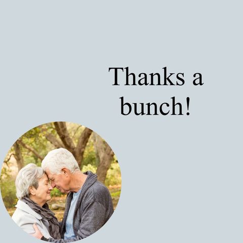 Senior couple in park with thankful message
