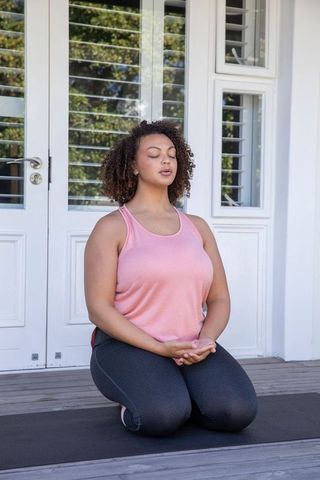 Mindful Meditation Practice Outdoor on Wooden Deck