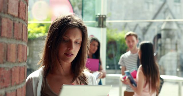 Student Reading Tablet in University Campus - Download Free Stock Images Pikwizard.com