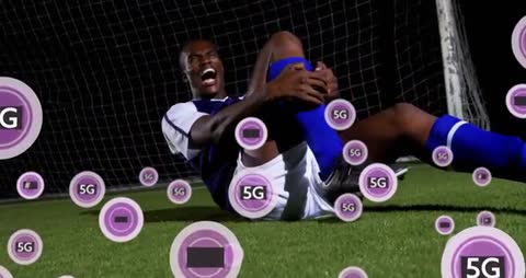 Soccer Player Dealing with Injury Surrounded by 5G Technology Symbols