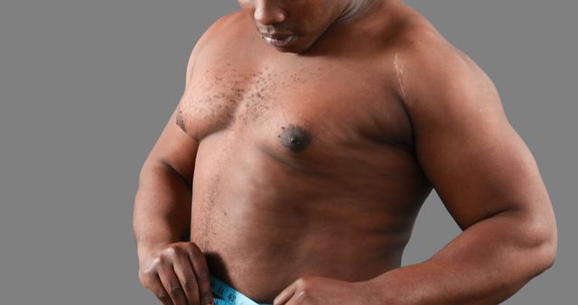 Concerned Man Checking Waistline Transformation - Download Free Stock Images Pikwizard.com