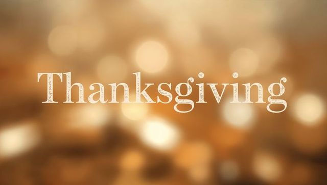 Thanksgiving Serif Lettering on Warm Golden Bokeh Background with Distressed Texture