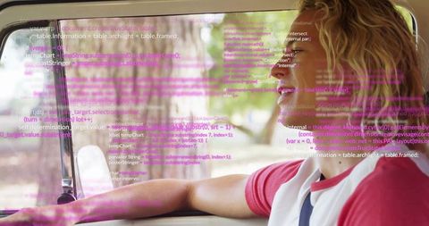 Man in Red Shirt Relaxing in Car with Programming Code Overlay