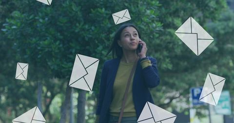 Woman with Smartphone Surrounded by Digital Envelopes