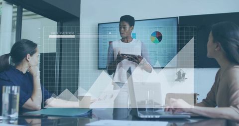 Diverse Team Discussing Financial Data in Modern Office Environment - Download Free Stock Images Pikwizard.com