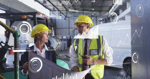 Engineers Reviewing Digital Blueprints in Warehouse with AR Data Overlays and Safety Gear