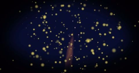 Abstract orange light streak with mystic yellow particles