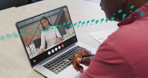 Businessman Holding Virtual Meeting on Laptop Screen