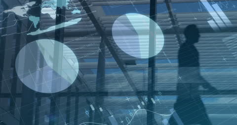 Silhouetted Professionals and Financial Data Overlay in Modern Office