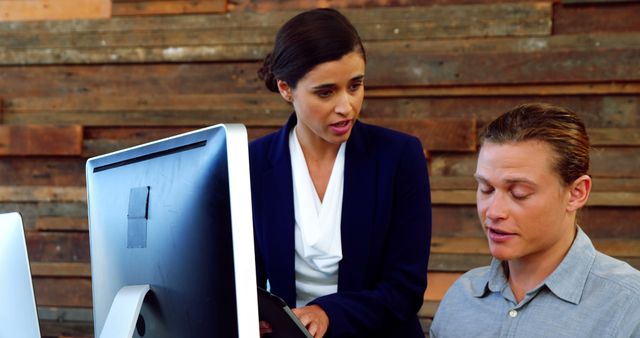 Businesswoman Supervising Employee Discussing Work Tasks - Download Free Stock Images Pikwizard.com