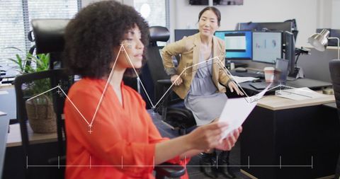 Diverse Businesswomen Analyzing Data in Modern Office - Download Free Stock Images Pikwizard.com