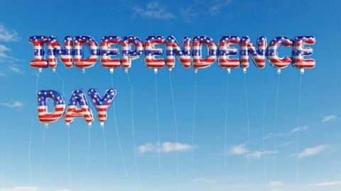 Foil Balloons Spelling Independence Day in Sky