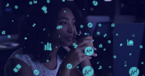 Working late woman holding coffee analyzing financial data overlays and analytics