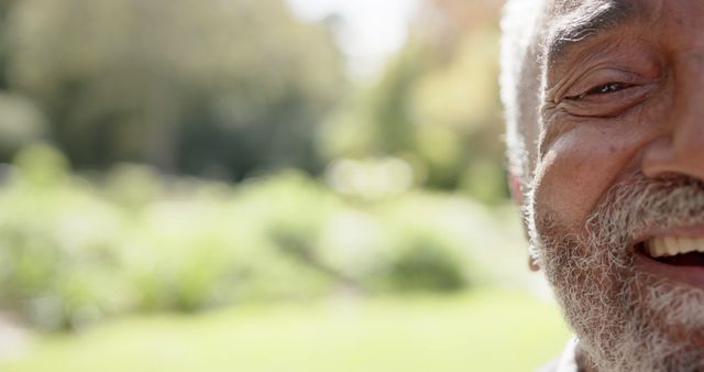 Happy Elderly Man Outdoors Facing Camera with Blurred Background - Download Free Stock Images Pikwizard.com