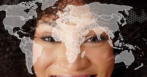 Smiling woman with world map overlay representing digital connectivity and global networks