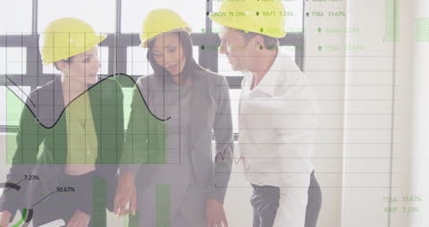 Engineers Collaborating with Financial Data Overlay