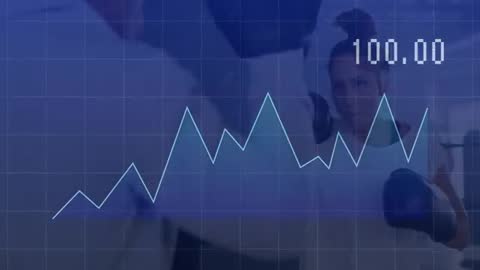 Female Boxer Training with Fitness Tracker and Performance Graph Display