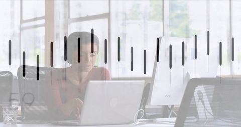 Businesswoman Analyzing Data at Modern Office with Chart Overlay