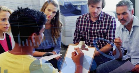 Business Team Collaborating on Financial Dashboard Visuals