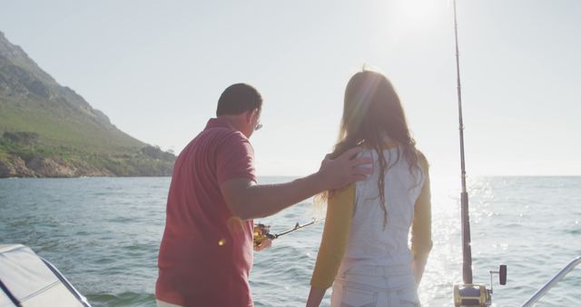 Father and Daughter Fishing on Boat at Sunset with Mountain View - Download Free Stock Images Pikwizard.com