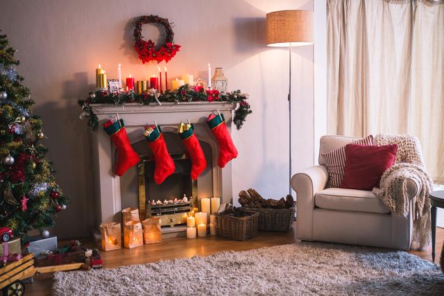 Living room decorated for Christmas with a cozy fireplace adorned with stockings, candles, and a wreath. A Christmas tree stands nearby with gifts underneath. Ideal for holiday-themed content, home decor inspiration, and festive greeting cards.