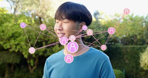 Asian teen smiling with braces wearing teal shirt with pink connected network overlay