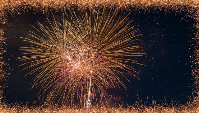 Golden Firework Explosion with Sparkler Border Celebrating Nighttime Festivities, Radiant Trails