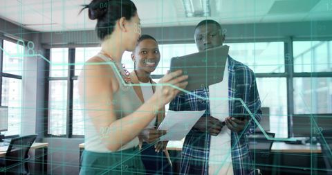 Financial Data Analysis with Diverse Business Team Using Tablet in Modern Office