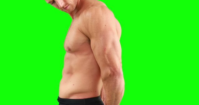 Fit Male Model Demonstrating Strength on Green Screen Background - Download Free Stock Images Pikwizard.com