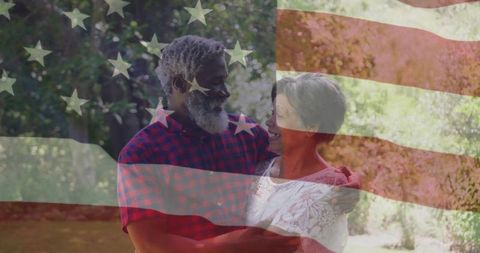 Interracial Couple Embracing Joyfully with American Flag Overlay