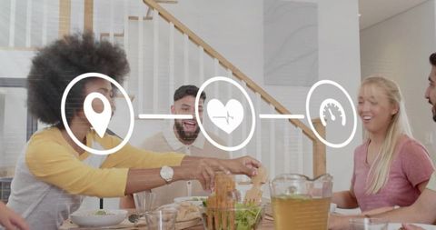 Friends passing salad and laughing at sunlit dining table with health, map and speed icons