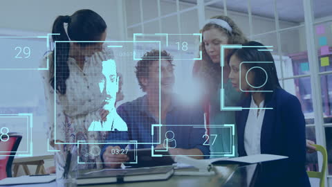 Diverse Team Collaborating with Digital Interfaces in Modern Office