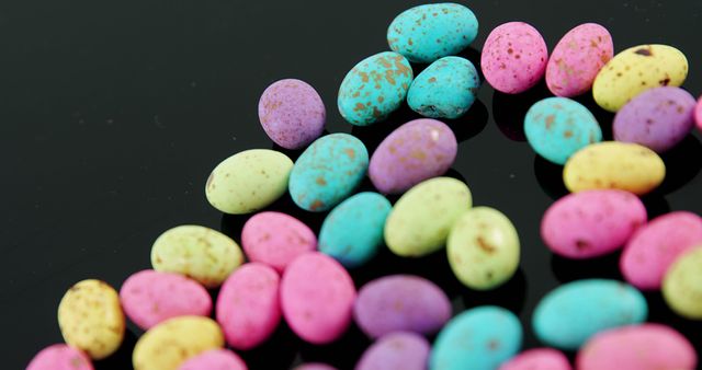 Colorful Easter Egg Candy on Dark Surface - Download Free Stock Images Pikwizard.com