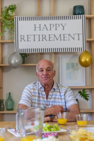 Senior Man Celebrating Retirement with Joyful Gathering