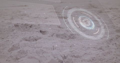 Projecting holographic hud interface over sandy terrain showing circular radar display