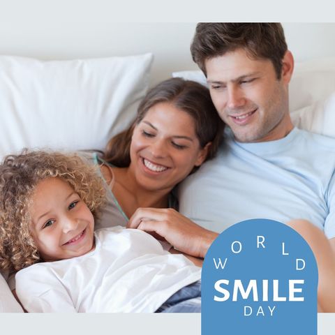 Happy diverse family celebrating world smile day