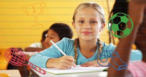 Writing student with sports doodles on notebook, classroom learning and creativity