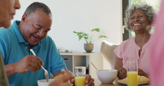 Happy Seniors Enjoying Breakfast Together at Home - Download Free Stock Images Pikwizard.com