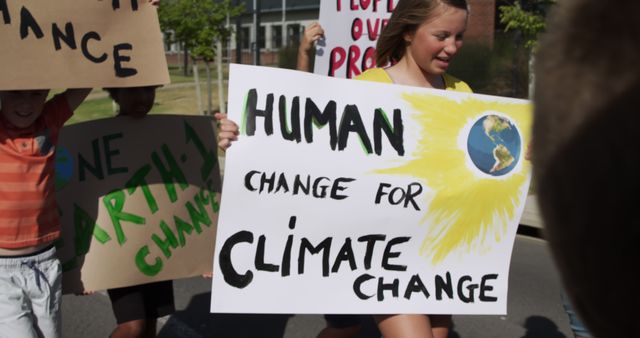 Children Rallying for Climate Change Awareness with Handmade Signs - Download Free Stock Images Pikwizard.com