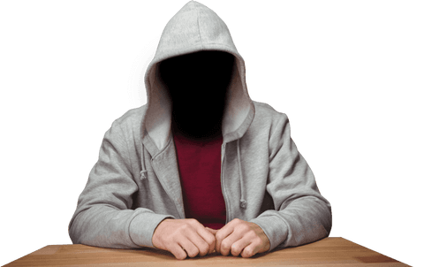 hooded figure in gray attire sitting at wooden table transparent background - Download Free Stock Videos Pikwizard.com