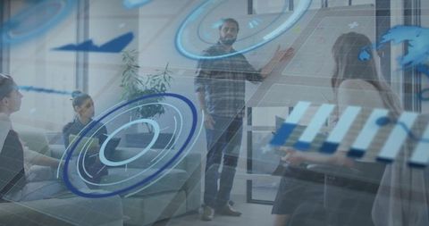 Presenting team meeting with augmented reality data overlays, man pointing at whiteboard