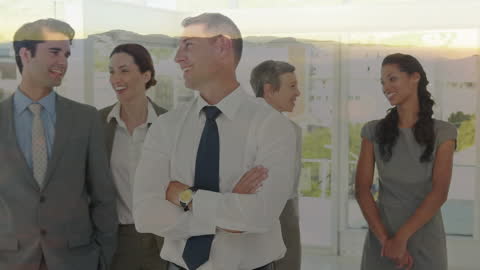Smiling Business Team Overlapping with Scenic Landscape